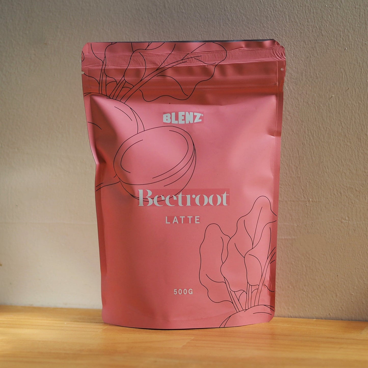beetroot latte powder in bag under natural light