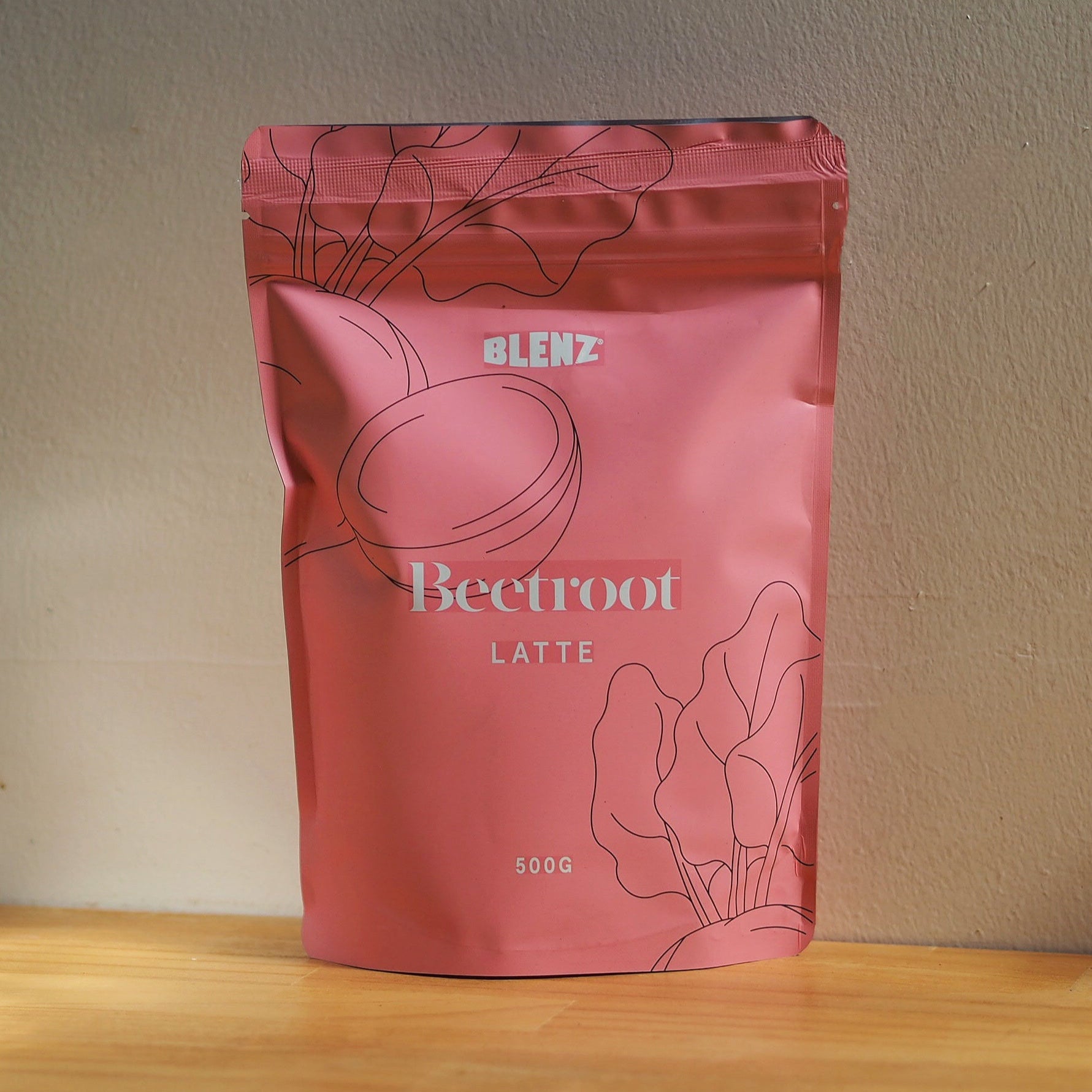 beetroot latte powder in bag under natural light